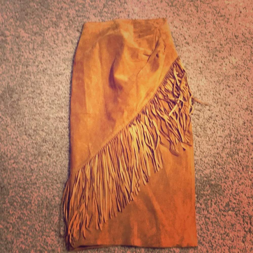 Tan fringe suede skirt.